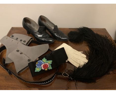 Vintage costume to include black leather ladies shows, Ostrich feather, black suede belt with bead decoration, black fabric a