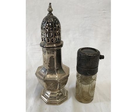 Two items of silver, hallmarked sifter pot J.A. London 1910 145gms and a silver topped scent bottle with indistinct hallmark.