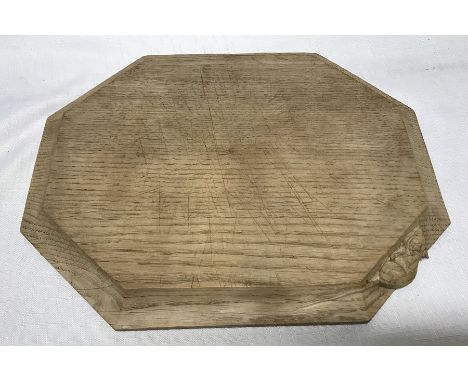 'Mouseman' oak cheese board of canted rectangular form by Robert Thompson of Kilburn, 31cm x 25cm. 2.5cms thickness. Conditio