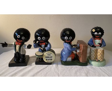 Four Carlton Ware Robertson Golly Band figured to include one limited edition Bongo Player 89/100, limited edition Piano Play