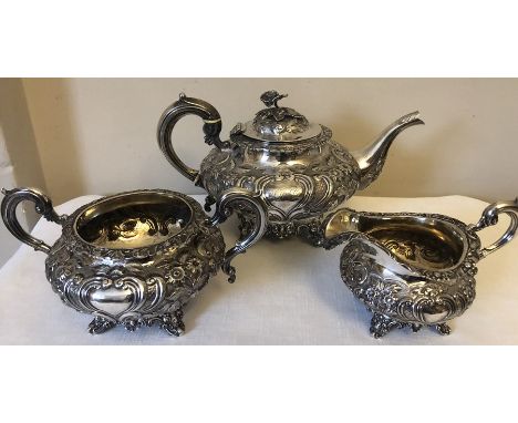 A three piece hallmarked silver tea service, teapot London 1843, possibly William Chawner. sucrier 1843, jug 1840, sucrier an