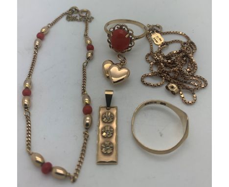 Nine carat gold including two charms, coral and gold bracelet, coral and gold ring, earring back and signet ring. 11.6g. Cora