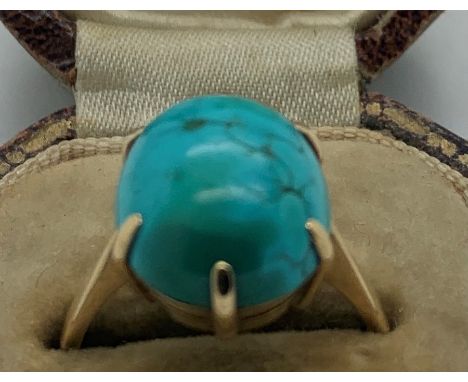 Turquoise dress ring set in 9ct gold, size N, 4gms total weight in vintage ring box. Condition ReportSome pitting and cracks 