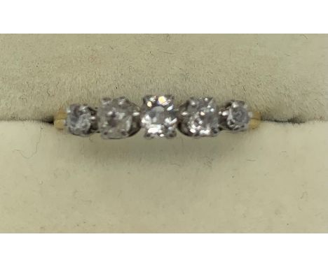 Five stone diamond ring set in yellow metal, marks rubbed, size Q, 2.5gms total.Condition ReportShank worn a little thin in p