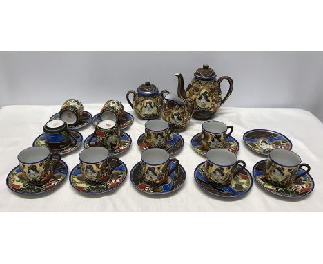 Decorative Japanese tea set, teapot, milk jug, sugar bowl, 11 cups, 12 saucers (26 pieces)Condition ReportMissing one cup, li