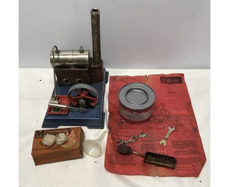 Wilesco German tinplate steam boiler with accessories and instruction leaflet. Base plate measures 20 x 15cms, 21cms h.Condit