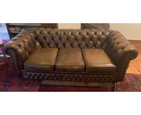 Brown leather button backed chesterfield sofa. 93d x 67h x 186w cm.Condition ReportBadly damaged to left front corner. Some s