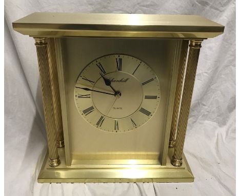 Churchill quartz brass effect mantle clock, Corinthian column sides, working. 22.5 w x 22 h x 9cms d. Condition ReportVery go