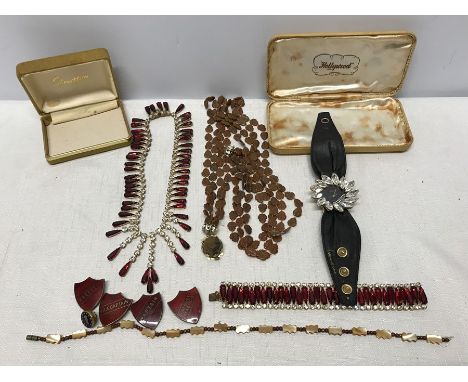 Selection of costume jewellery. Necklace and bracelet set with clear and red stones, two other necklaces, a ladies Shiva quar