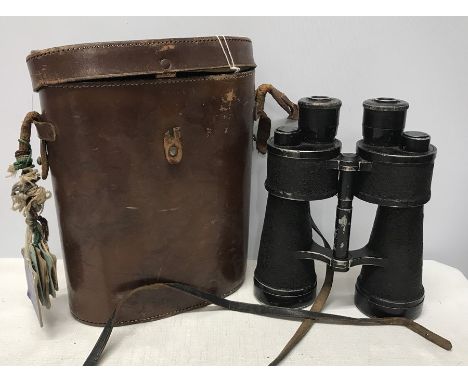 Pair of leather cased binoculars, stamped beh 441097. 7 x 50. Condition ReportFoxing inside lens, dent to outer lens ring, pa