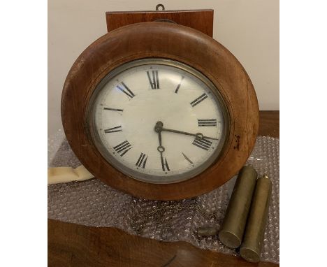 A 19thC postman's alarm clock with pendulum 35cms d. Condition ReportUntested