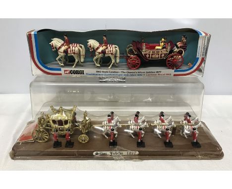 Corgi Queens Silver Jubilee Coach 1977 and another Silver Jubilee 1977 coach in display case. Condition ReportCorgi in a good
