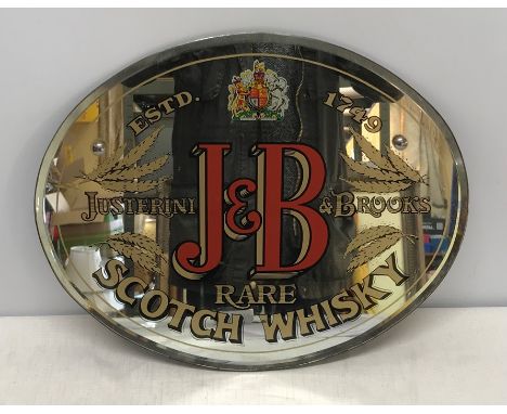 Breweriana, oval bevel edged pub advertising mirror, J and B rare whisky 39.5 w x 33cms h. Condition ReportMinor ware to mirr