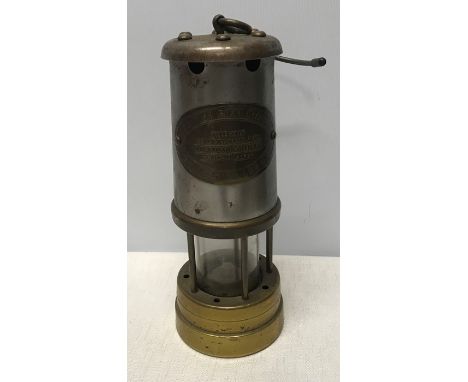 Brass and metal coal mining lamp. Aberaman Colliery Wales, 22cms h. Condition ReportLight surface rust to metal, overall in a