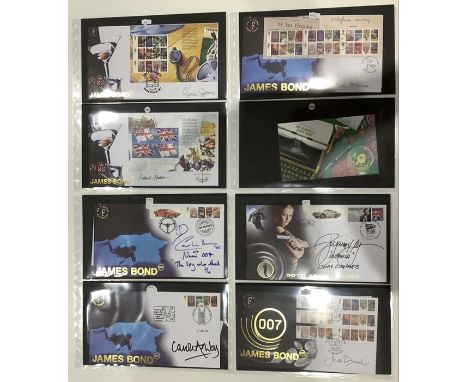 A collection of 30 First Day Covers relating to James Bond signed by Roger Moore x 2, Sean Connery, George Lazenby, Richard K