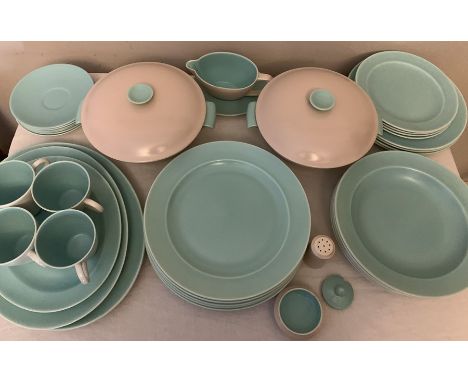 A Poole pottery twin-tone part dinner and tea service to include 5 x 24cms d bowls, 4 x 23cms plates, 6 x 26cms plates, 2 lid