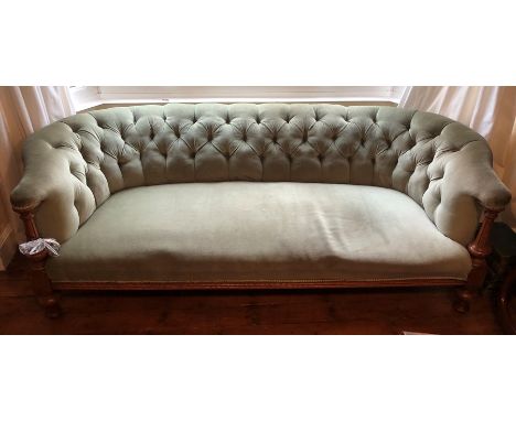 A 19thC oak and button backed sofa with turned front legs. Scuffs to front legs. 212 w x 68 h (without castors) x 90cms d. Ap