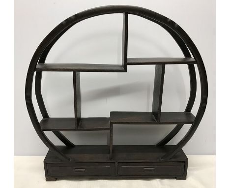 Chinese wooden circular trinket shelf with two drawers. 41 h x 41cms w. Condition ReportSmall split to wood on middle shelf. 