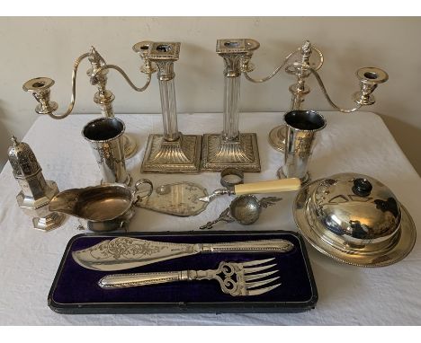 A quantity of good quality silver plated items to include two candelabra, a pair of plate and glass items to include two cand