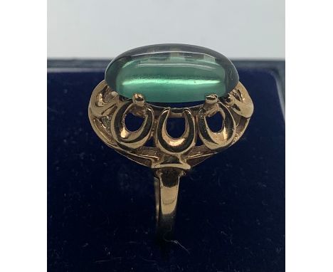 A 9ct gold and tourmaline dress ring, size P, 4.7gms total weight. Condition ReportSlightly misshapen shank otherwise good co