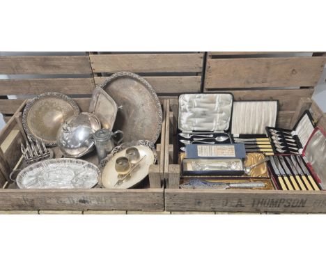 Two crates of silver plated wares: Boxed cutlery sets, Selfridge &amp; co containing two Berry spoons, Boxed ornate serving f