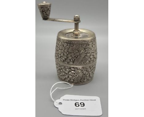 White metal Pepper Mill Grinder. Designed with raised relief Indian buddha figures. 