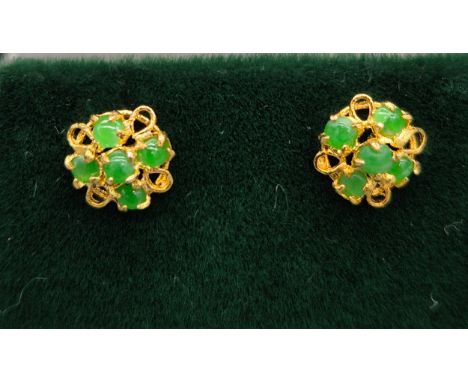 A Pair of 14ct yellow gold and jade earrings. Butterfly backs stamped '585'. 