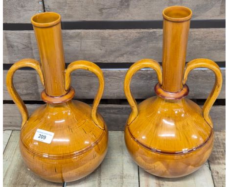 A Pair of Dunmore pottery double handle bottle neck vases. Impressed stamp "Dunmore" [34.5cm high]