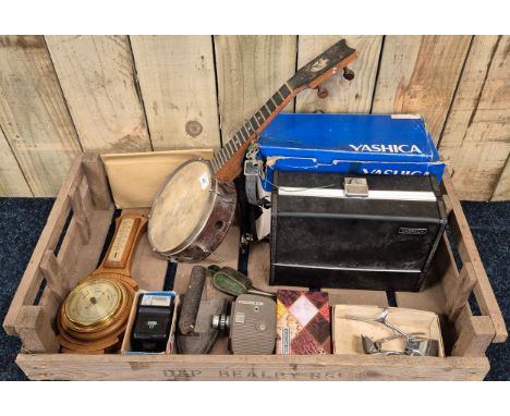 A selection of collectables; Vintage Keech ukulele, oak barometer, Yashica movie camera &amp; other items