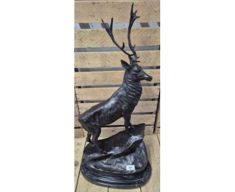 After Jules Moigniez [1835-1984]A Large reproduction patinated Bronze sculpture of a highland stag. Sat upon a marble base. [