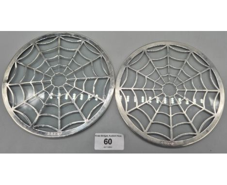 Pair of Birmingham silver and glass resting trays. Produced by Adie Brothers. [15.5cm diameter] 