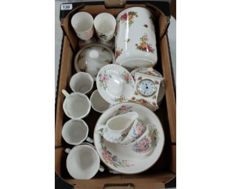 A collection of pottery to include Royal Albert biscuit barrel, mantle clock, Royal Doulton Arcadia dinnerware etc
