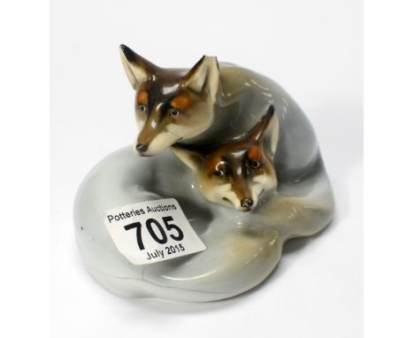 Royal Doulton pair curled foxes HN117 in light blue and natural colours  (crack to reverse & ear chipped)