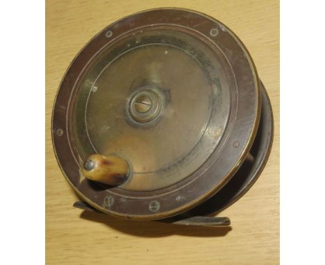 Vintage brass fishing reel, 11cm diam