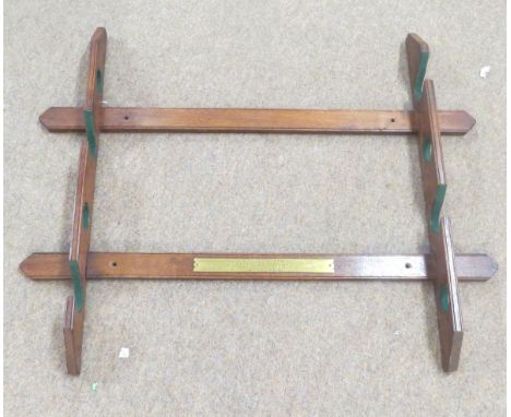 Vintage wall mounted wooden gun rack for four guns, presented by Graham, Graham &amp; Co, Pheasant food makers, Trowse, Norfo