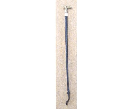 Vintage riding crop with brass handle moulded as a dog   