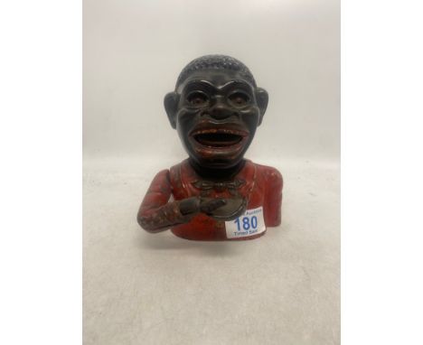Cast Iron The Jolly Fellow Money Box. Height: 16cm
&nbsp;
Notice from the&nbsp;the-saleroom.com:&nbsp;These items are listed 