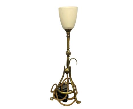 Mid 20th Century desk lamp raised on three tripod feet with white shade