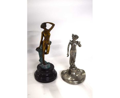 White metal Art Nouveau model of a lady on shaped base together with a further bronze type Art Nouveau lady on black onyx bas