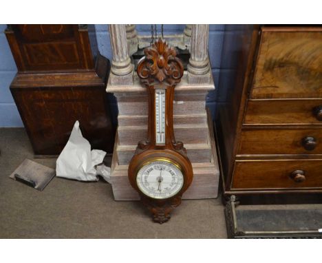 A late Victorian oak cased barometer
