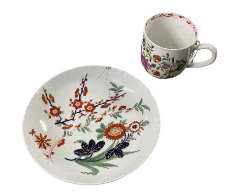 A Worcester porcelain saucer in the Kempthorne pattern together with a further Worcester cup painted with flowers (both a/f)