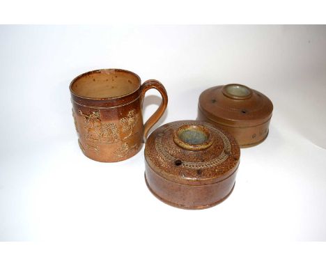 A 19th Century salt glazed Capstan style ink well together with a further ink well and Doulton style hunting mug