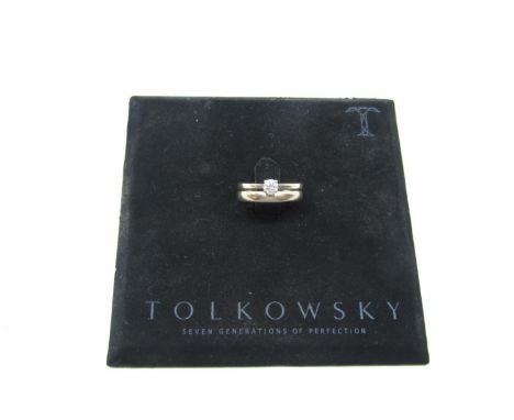 18ct diamond solitaire engagement ring and wedding ring, the diamond 0.27cts, both size N, contained in a Tolkowsky leather c