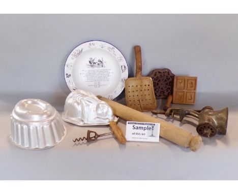 A collection of various vintage kitchenalia comprising marble boards, wooden rolling pins, enamel wares, treen bowls, mincers