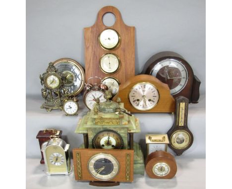 A collection of various vintage time pieces comprising a green veined mantle clock, various other vintage clocks, barometers,
