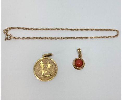 18ct engine turned pendant depicting two figures, together with a further small 18ct pendant set with cabochon coral and a 9c
