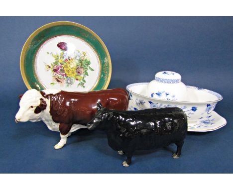 A Beswick Aberdeen Angus cow together with a Beswick Hereford bull with ring through its nose, also together with a small col