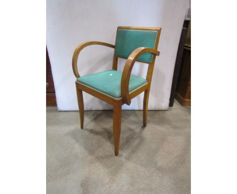 A 1940's French open armchair with stained beechwood frame raised on square tapered and slightly swept supports,&nbsp;togethe