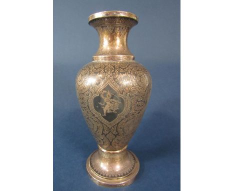 A good quality eastern silver and niello enamel inlaid baluster vase decorated with Islamic panels of Buddhistic deities, ins