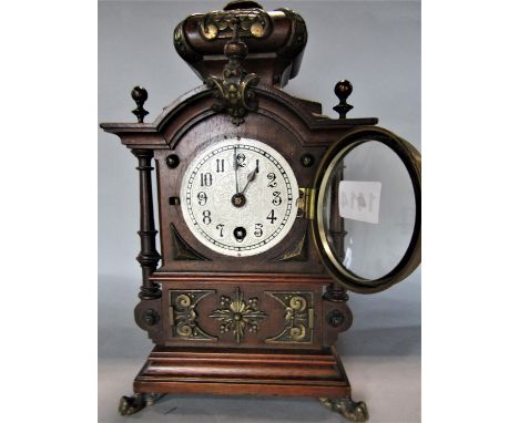 Small continental fruitwood architectural single train mantle clock with Islamic finial mount, engraved silvered dial, 29 cm 